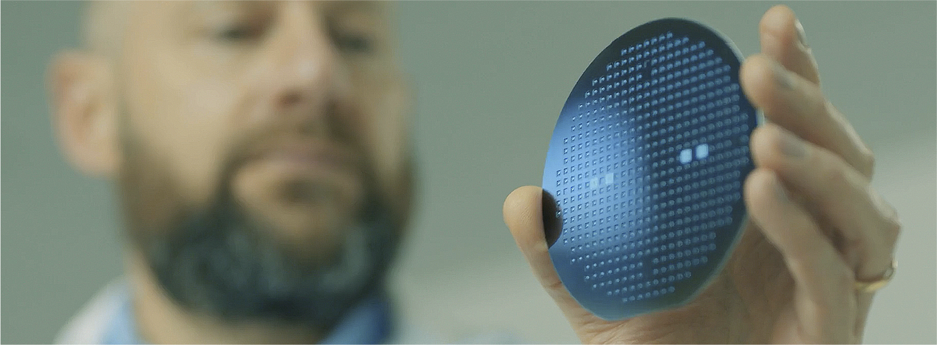 Baker Hughes lifestyle photography showing a person holding a component.