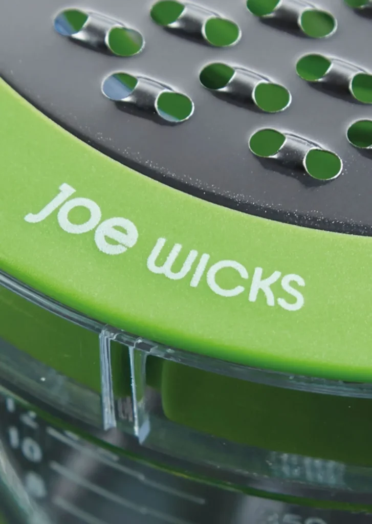 Close up photography of Joe Wicks branded cheese grater.