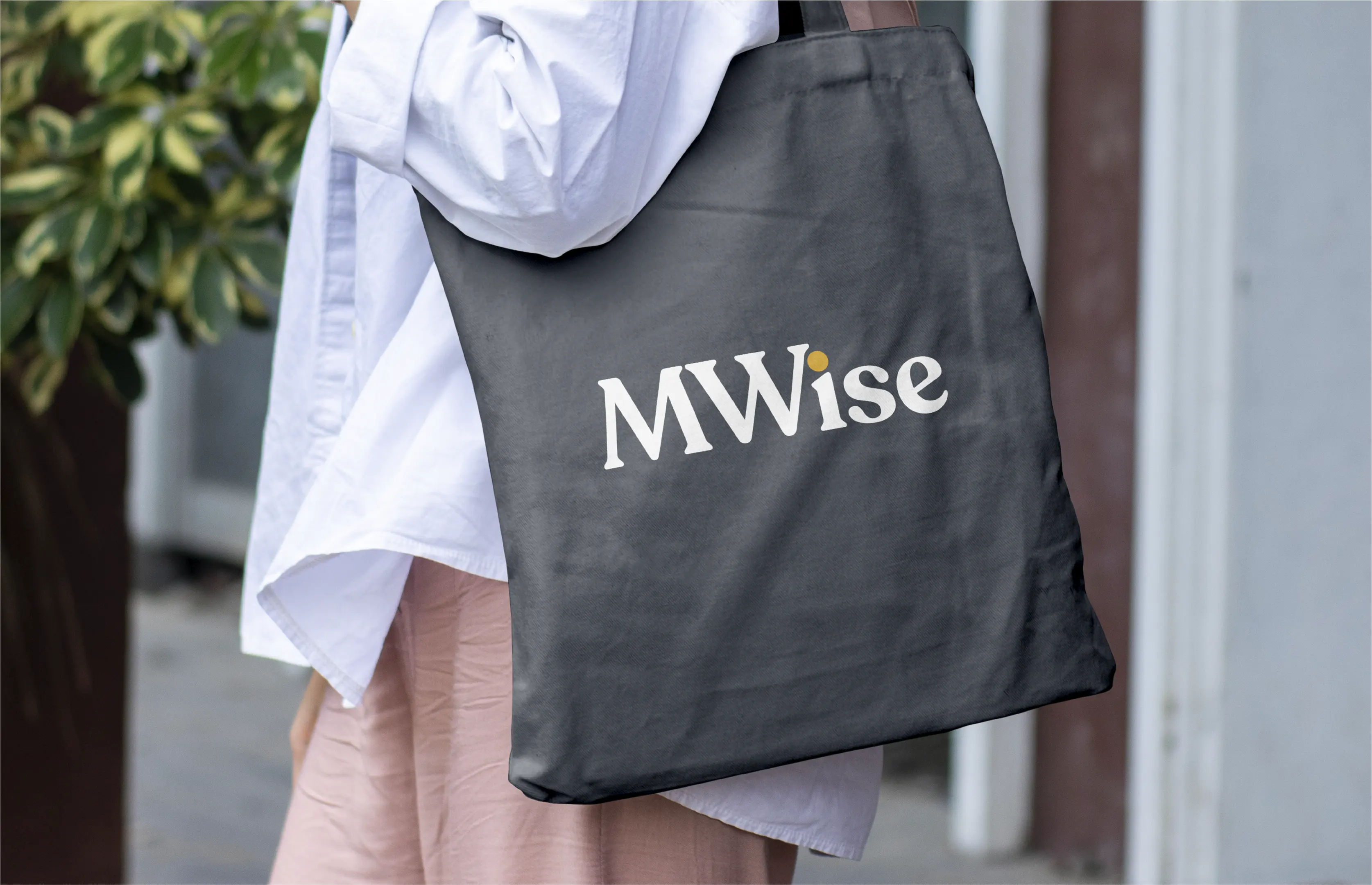 Mwise branded tote bag.