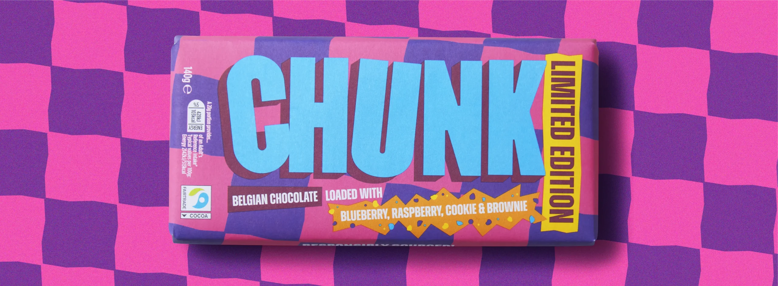 Blueberry, Rasberry, Cookie & Brownie Limited Edition Chunk chocolate bar photographed on top of a wavy pink and purple chequerboard pattern